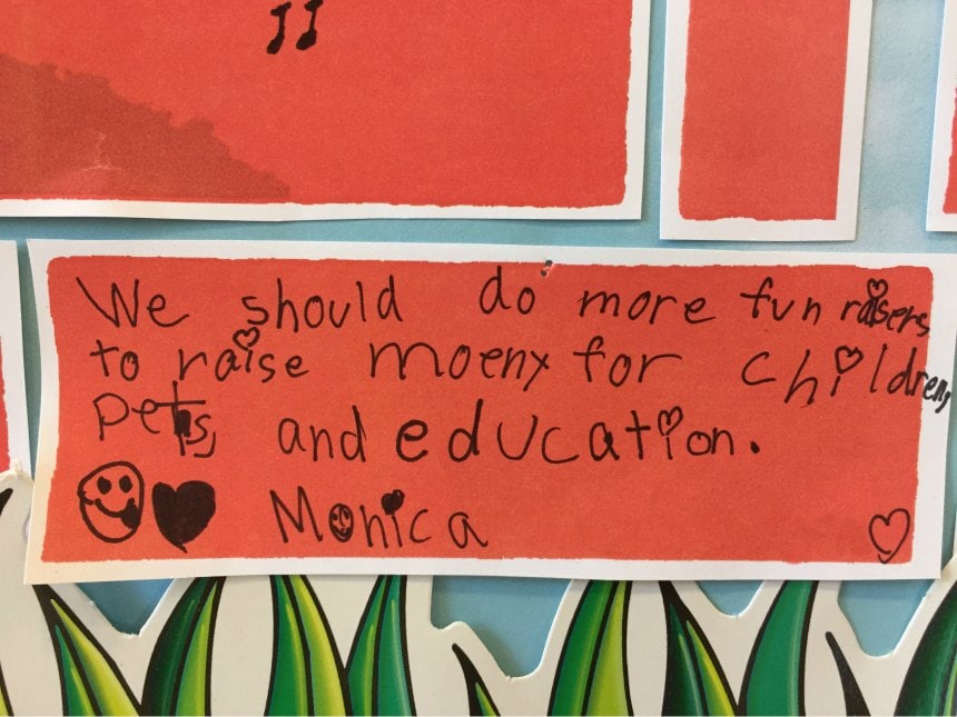 Child's handwriting: We should do more fun raisers to raise moeny for children, pets, and education. -Monica